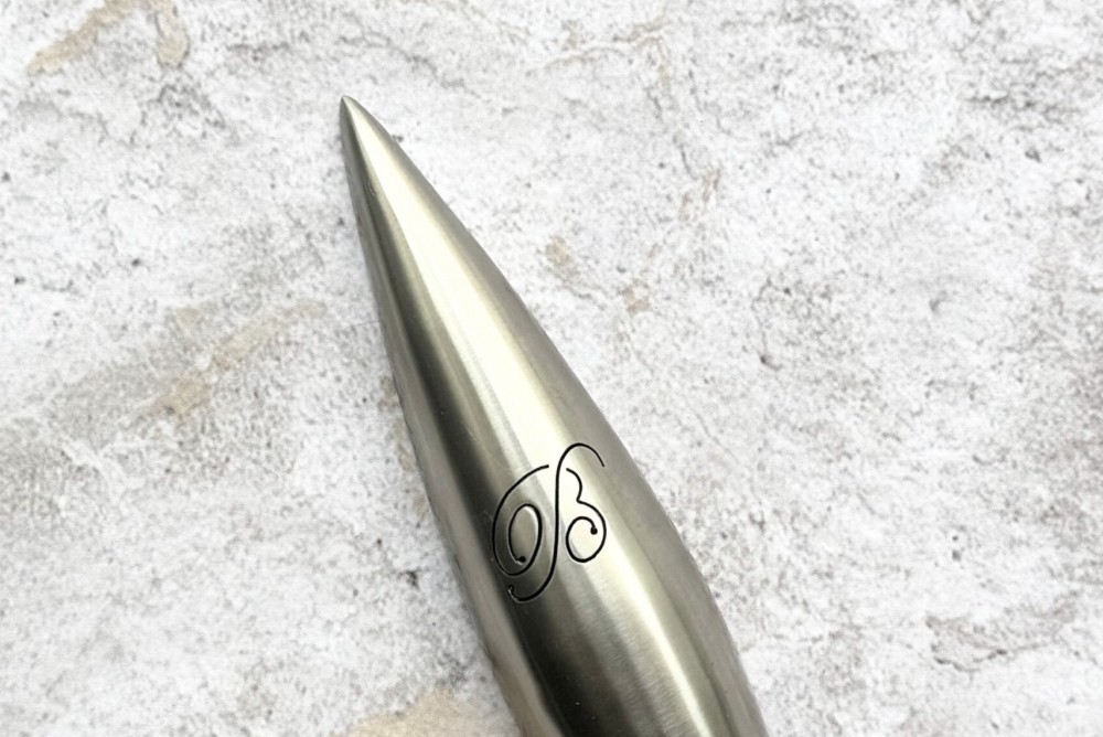 Close up of Monogram Rocket Mezuzah by Laura Cowan