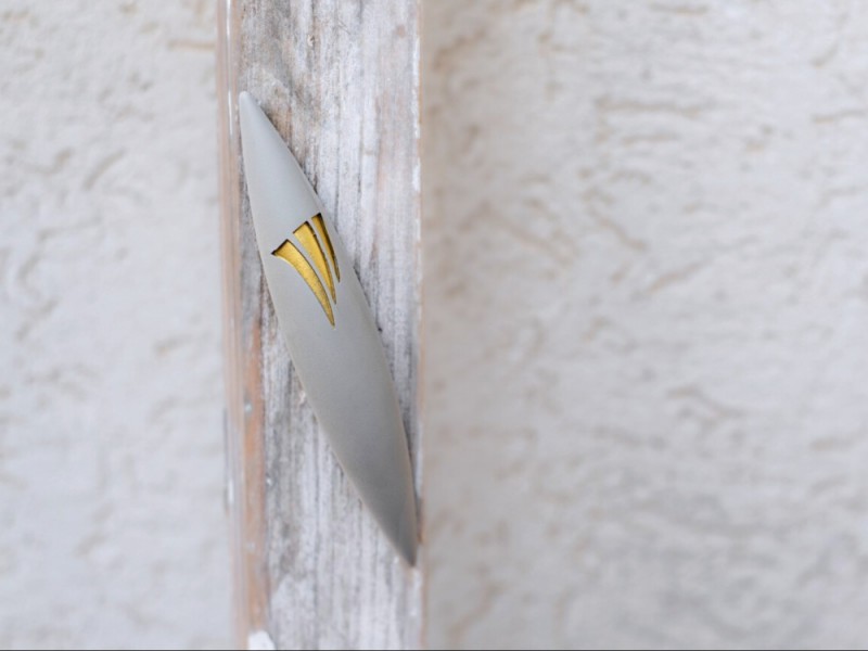Grey Apollo Stone Mezuzah mounted vertically on wall
